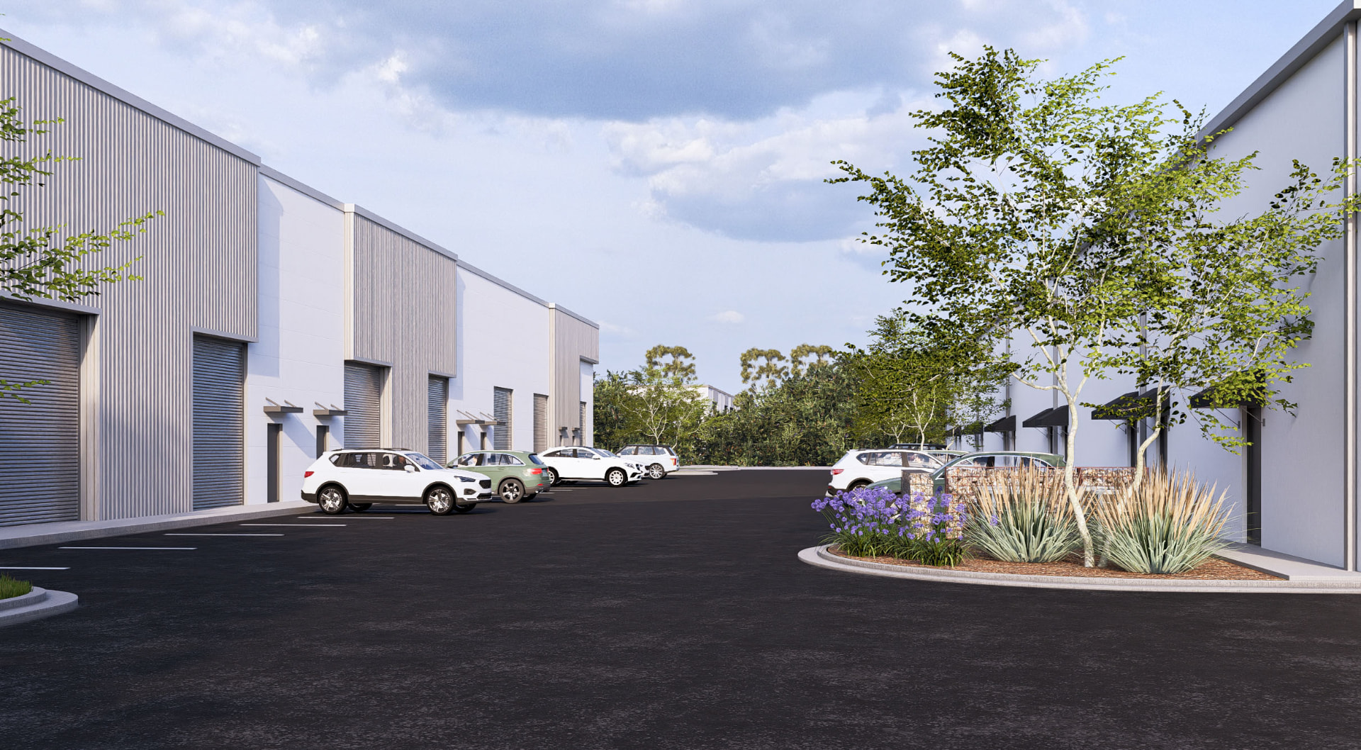 Drive aisle between Spencer Plaza flex buildings with parking