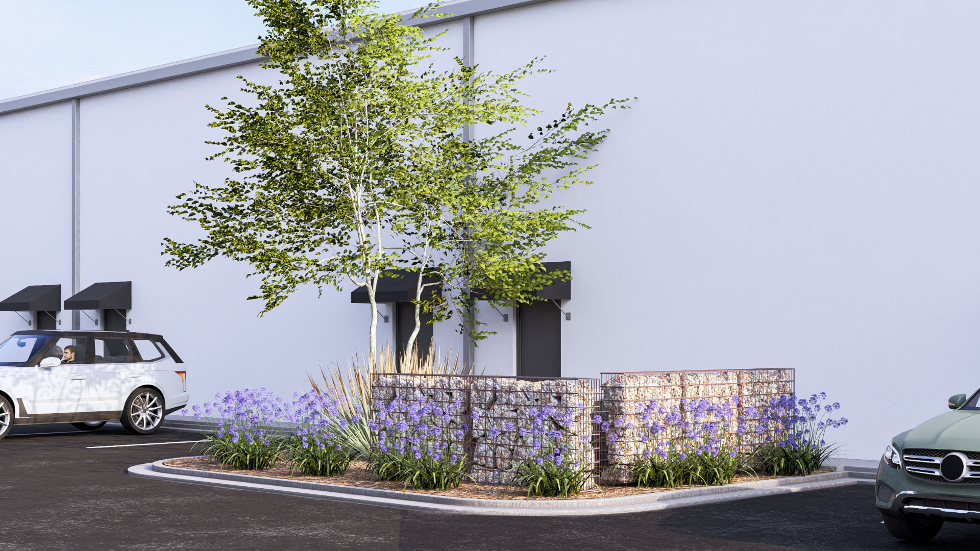 Landscaped planter and tenant entries at Spencer Plaza