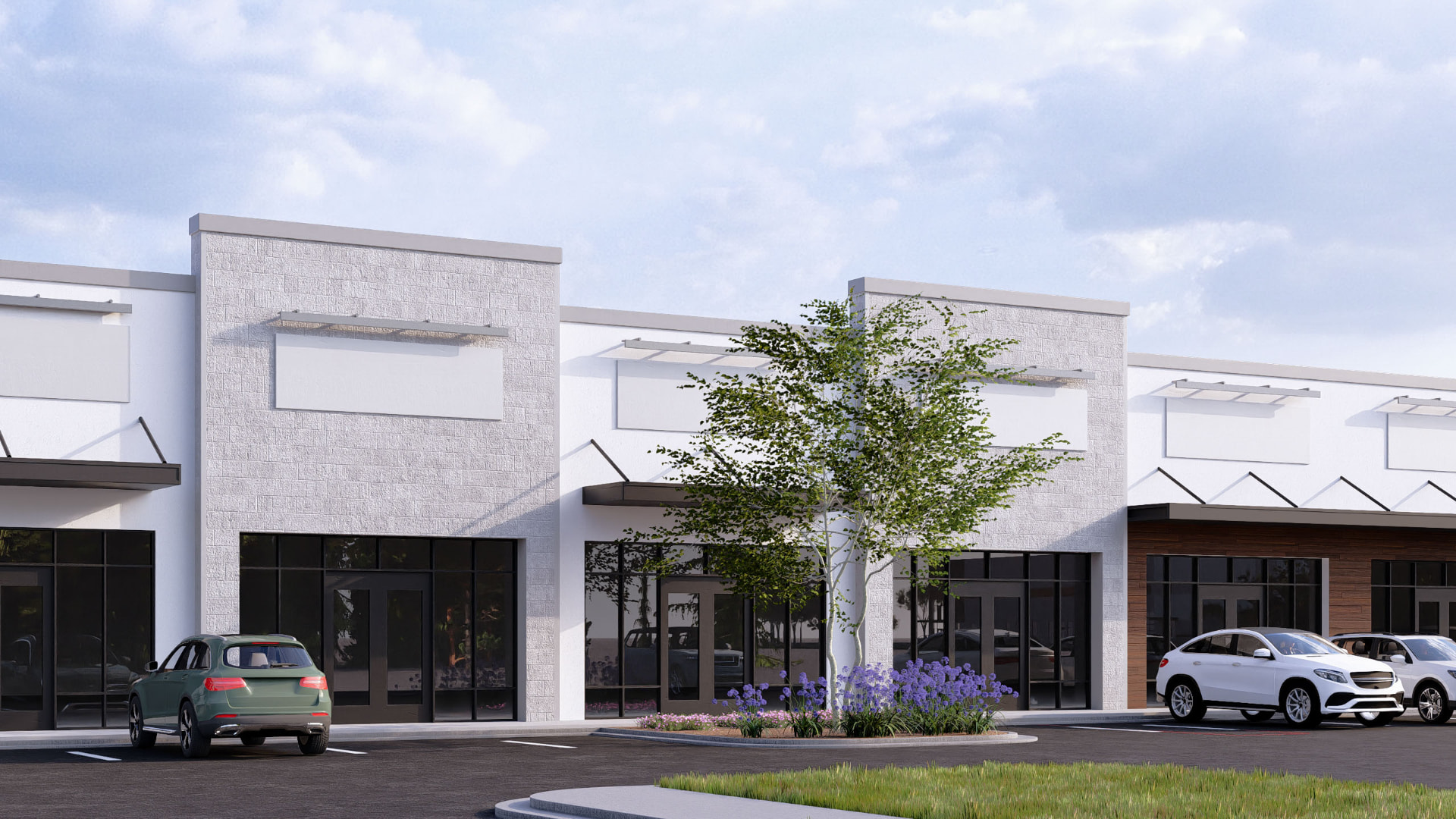 Spencer Plaza retail shops with covered entries and landscaping